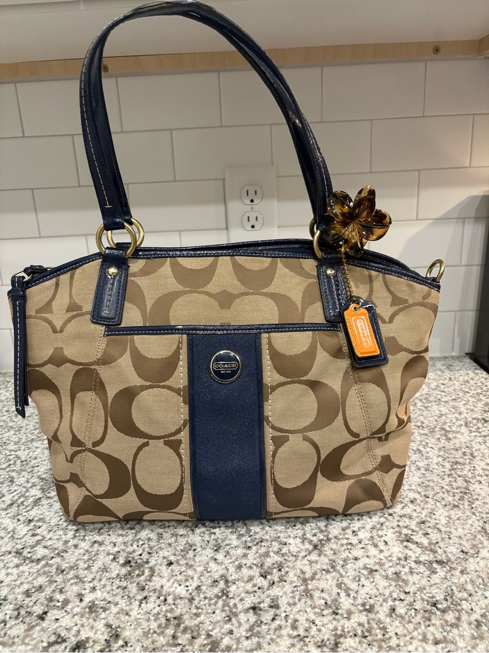 Coach Beige Signature Canvas Tote with Navy Trim and Gold Accents
